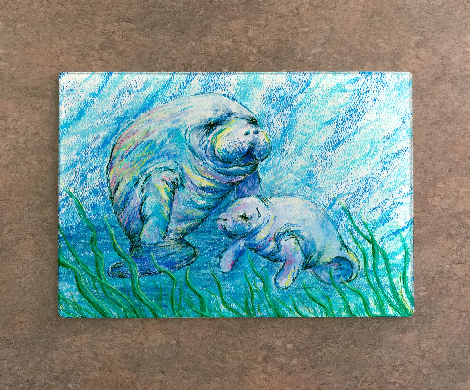 Manatees in Grass Cutting Board